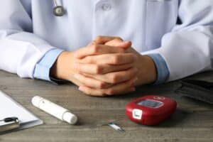 endocrinologist with a glucometer diabetes