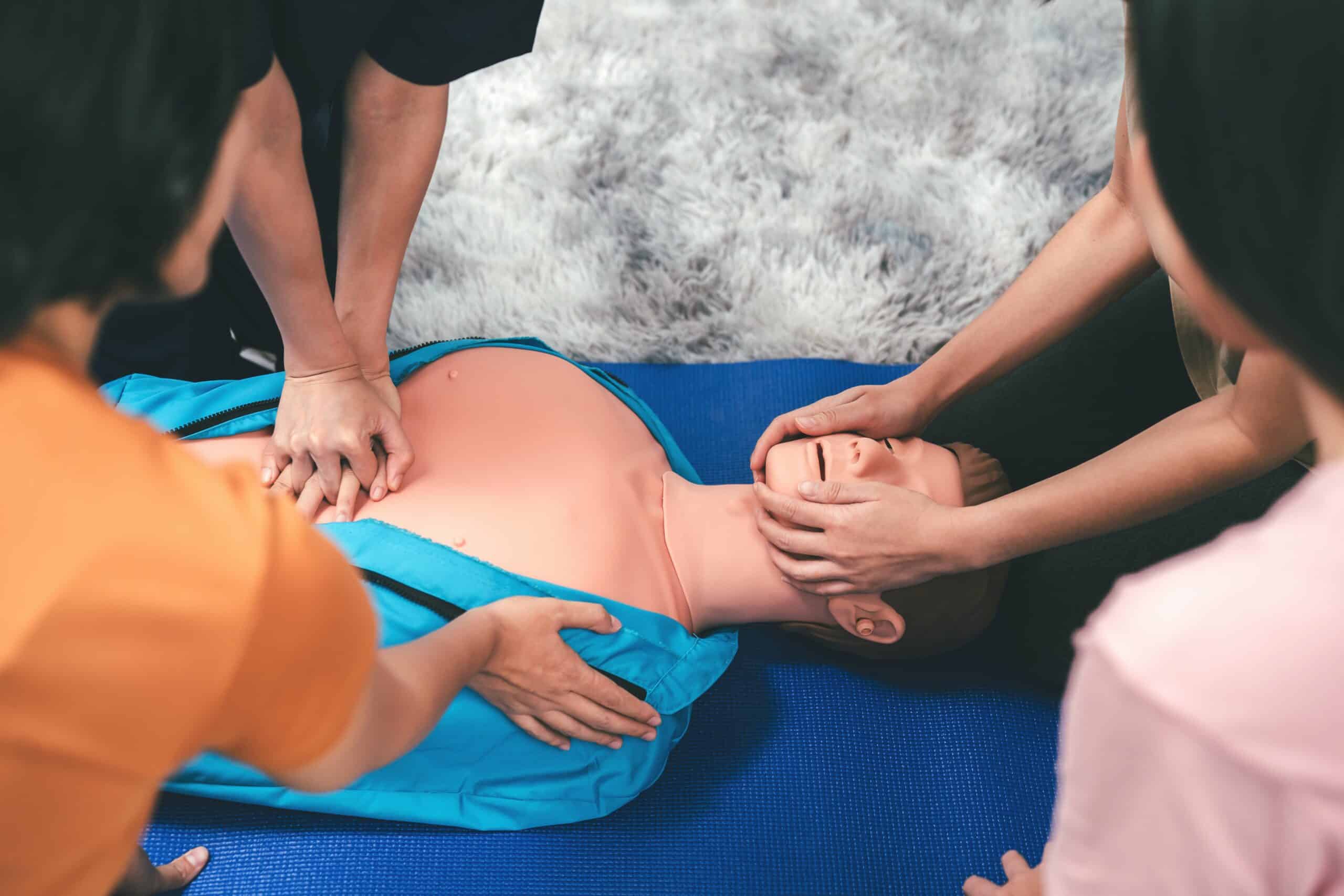CPR Training ,Emergency and first aid class on cpr doll, Cardiopulmonary resuscitation, One part of the process resuscitation on unconscious person.