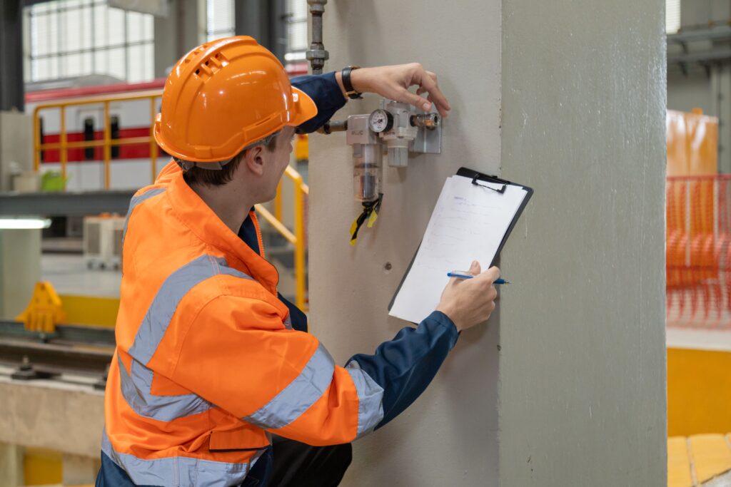 Engineer checks spare parts list and maintains mass transit locomotives for Workplace safety