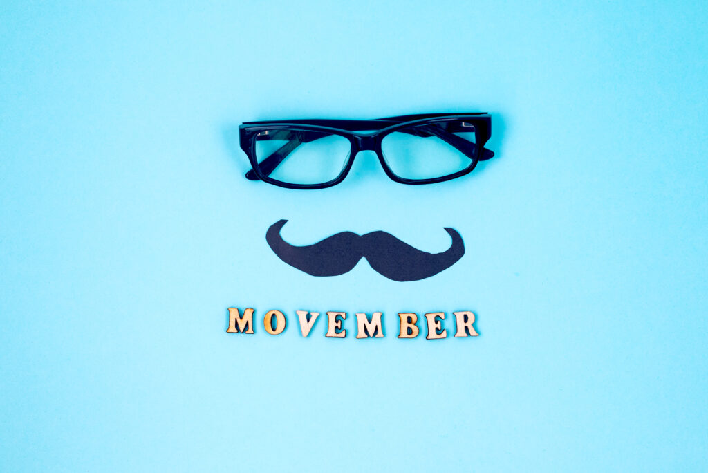 November Prostate Cancer Awareness month, blue ribbon, mustache,