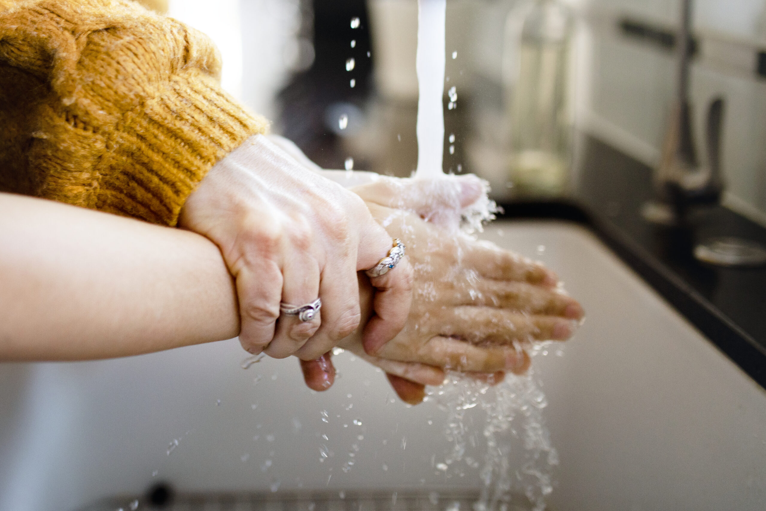 Boy washing hands