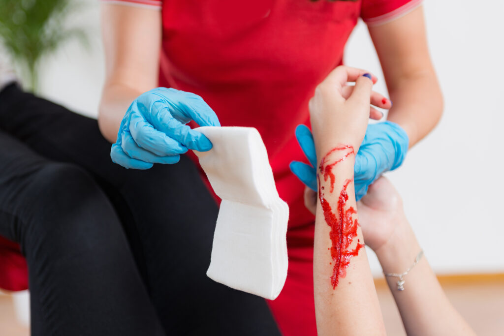 First Aid Training Arm cut for severe bleeding control