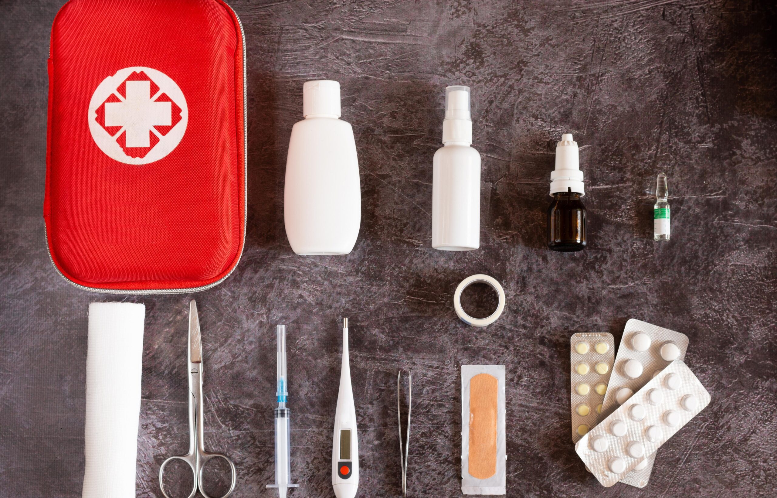 First aid kit concept, medicine equipment set in a suitcase box