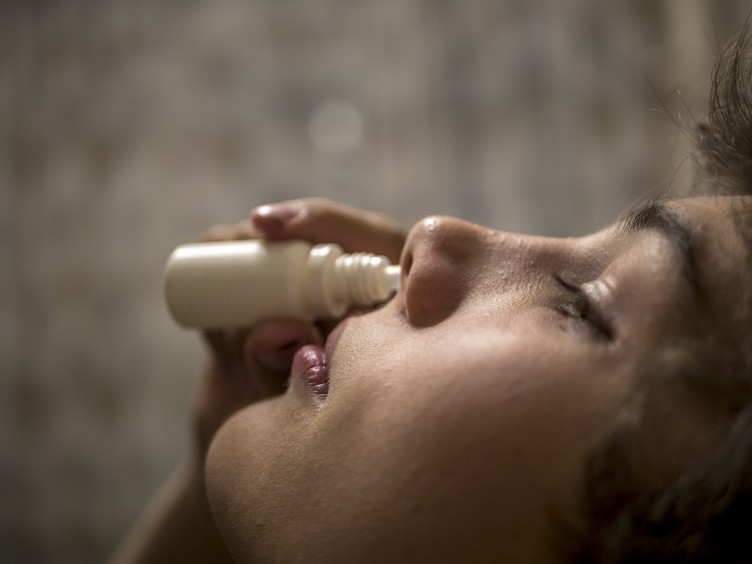 close up portrait of young boy drip in nose