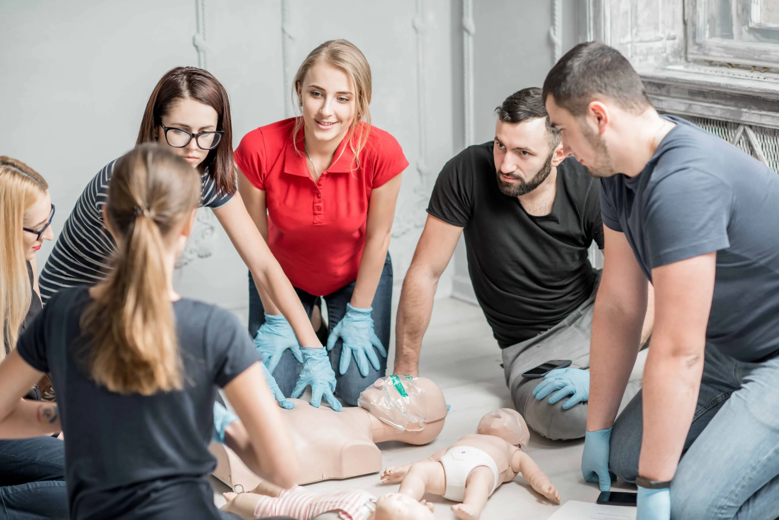 Sydney participants practicing CPR skills under instructor’s guidance first aid skills