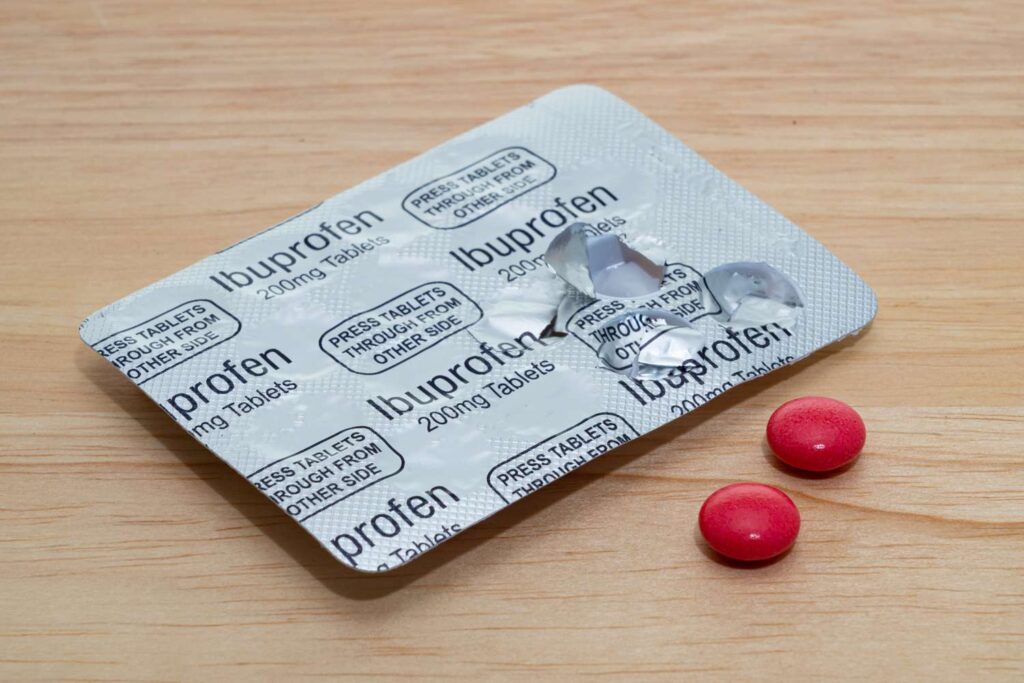 Ibuprofen silver packet with two loose tablets