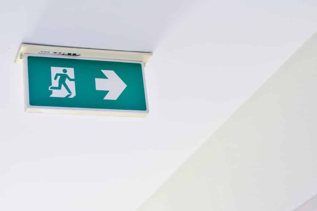 Green evacuation sign